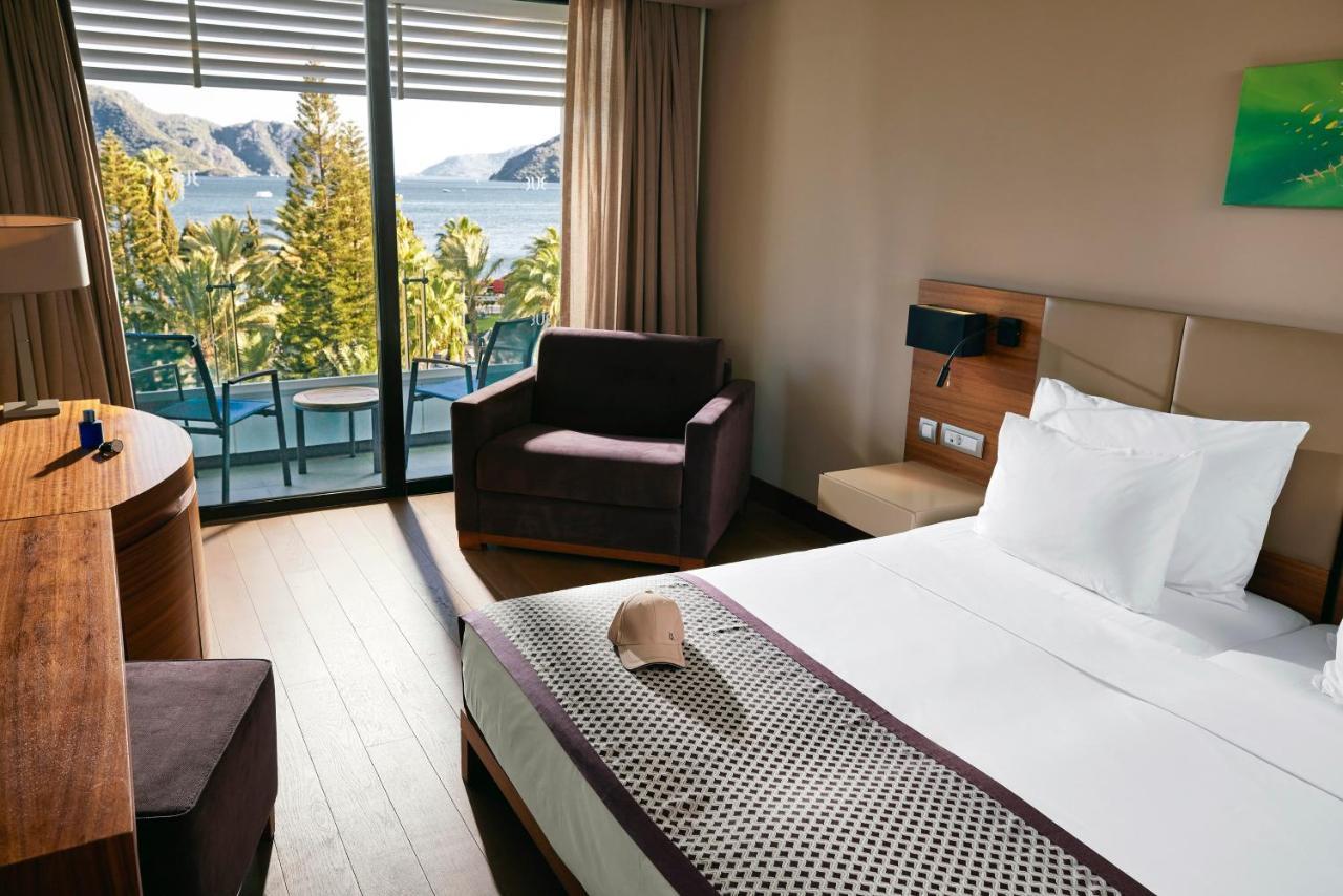 Tui blue grand azur 5 marmaris. TUI Blue Grand Azur 5. TUI Blue Grand Azur (ex. Grand Azur Marmaris ) 5*. TUI Blue Grand Azur Standard Room. TUI Blue Grand Azur Пирс.